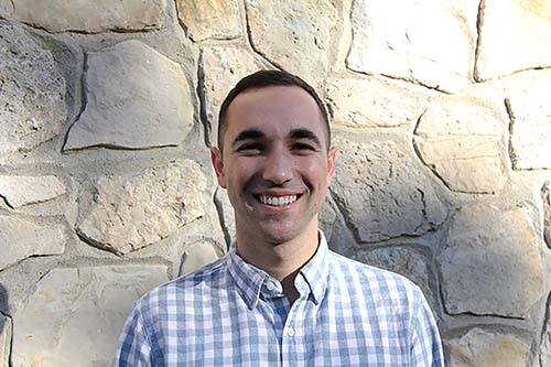 Headshot of JT Thoms