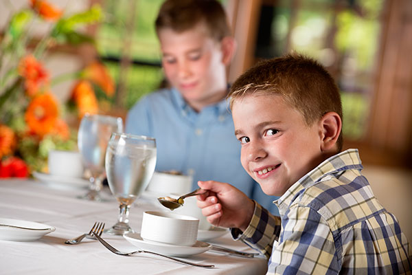 Young boy at etiquette classes in Branson